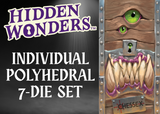 Advertisement for 'Hidden Wonders' individual polyhedral 7-die set with a wooden door design and Chessex branding.
