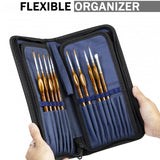 Set of paintbrushes in a flexible organizer held by a hand on a white background