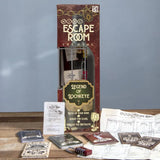 Escape room game set with packaging and components on a wooden surface.