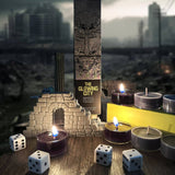 Tabletop game setup with candles, dice, and a book titled 'The Glowing City' against a cityscape background.