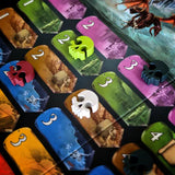 Colorful game cards with numbers and various designs on a dark surface