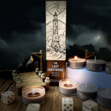 Board game box titled 'The Last Lighthouse' with candles and dice on a dark background