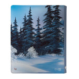 Card holder with a winter forest design featuring snow and trees.