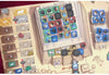 Board game components including tiles and cards on a wooden board