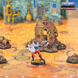Toy figure on a hexagonal tile with 'Masters of the Universe Battleground' branding.