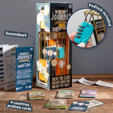Whiskey Journey game packaging with cards and padlock on a wooden surface