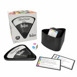 Trivial Pursuit The Beatles game set with packaging, cards, and dice on a white background
