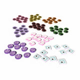 Assorted colorful buttons and decorative elements on a white background
