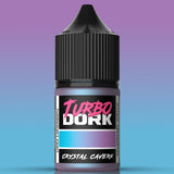 Bottle of Turbo Dork Crystal Cavern paint with a gradient background