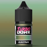 Bottle of Turbo Dork Electrum paint with a gradient green background
