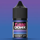 Bottle of Turbo Dork Midnight City paint with a black cap on a gradient blue and purple background.