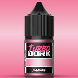 Bottle of Turbo Dork Sakura paint on a pink background