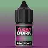 Bottle of Turbo Dork 'Shell Shocked' paint with a gradient background
