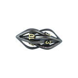 Black and gold elliptic die on a white background