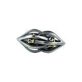 Silver die with gold accents on a white background