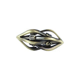 tarnished gold elliptic die on a white background