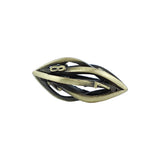 tarnished gold elliptic die on a white background