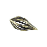 tarnished gold elliptic die on a white background