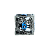 Silver charm with blue number 6 on a white background