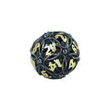 Black and gold die with numbers on a white background