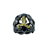Black and gold dice on a white background