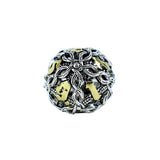 Silver and gold die on a white background