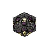Black and gold polyhedral dice with purple numbers on a white background