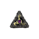 Triangular object with gold symbols and a purple gem on a white background