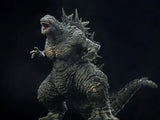  Godzilla figure with detailed texture on a dark background