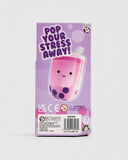 Product packaging with a pink bubble tea toy and 'Pop Your Stress Away!' text on a purple background.
