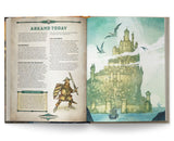 An open book showing printed pages about a fantasy city and illustration of a castle on water, photographed against a plain white background.
