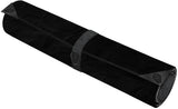 Black rolled-up dice mat on a white background