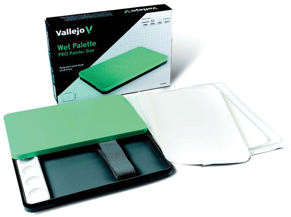 Green painting wet palette with white paper and Vallejo packaging on a white background