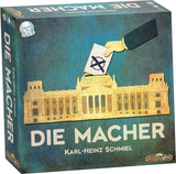 Board game box titled 'Die Macher' with a hand casting a vote into a building.