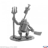 Gray miniature figurine of a warrior with weapons on a white background
