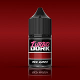 Turbo Dork Red Queen paint bottle on a red background