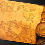 Vintage-style map with a compass on a dark surface