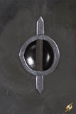 Close-up of a metallic emblem on a dark background
