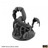 A dark gray unpainted tabletop gaming miniature of a scorpion on a round base, photographed against a solid white background. The RMP Brand logo is visible in the bottom right corner.
