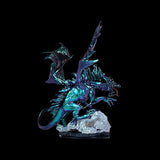 Dragon figurine with a glowing blue and purple color on a black background