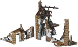Model of a ruined stone structure on a white background