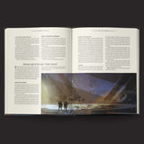 Open book with text and a futuristic landscape illustration on a dark background