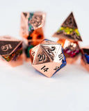 Metal polyhedral dice with numbers on a light background
