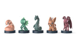 Five colorful figurines on a white background