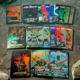 Collection of colorful game cards on a stone surface