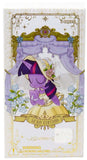 Card packaging with a character design, flowers, and decorative elements on a white background.