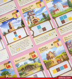 Collection of board game cards with various illustrations and text