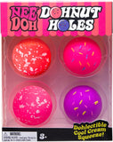 Packaging of Nee Doh Donut Holes with colorful donut-shaped toys.