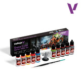 Vallejo V Game Color Starter Value Set including a black box, ten small bottles of acrylic paint in various colors, a small unpainted fantasy figurine, and a fine detail brush on a white background.