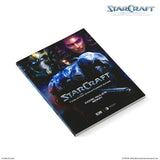 StarCraft Tabletop Miniatures Game Core Rules Book shown at an angle on a white background, with the StarCraft logo visible in the top right and copyright text at the bottom.